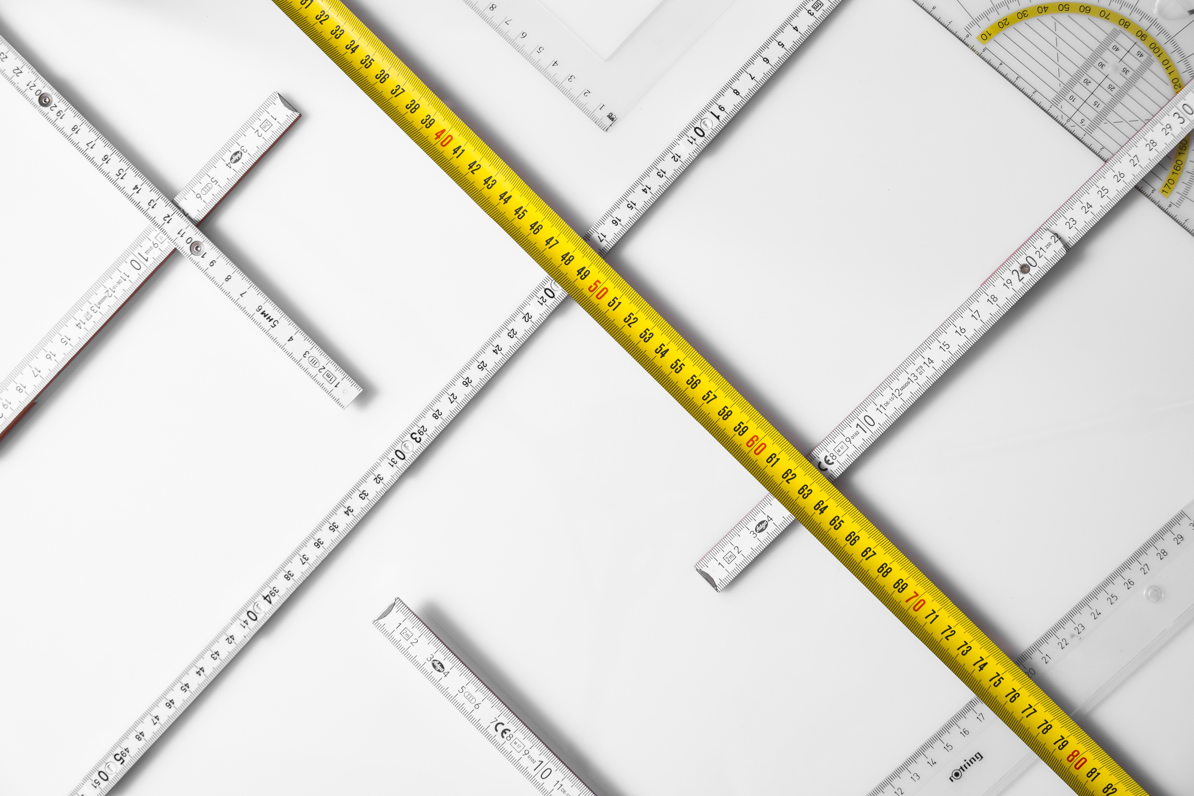 Metric Tapes on White Background